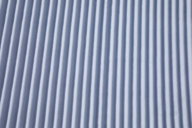 istock snow track lines on a ski slope left by a snowcat 925586506