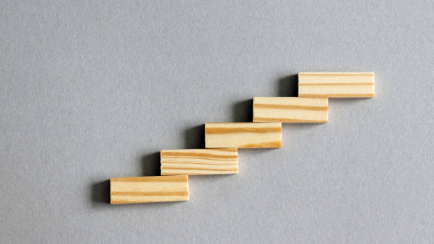 istock Five wooden block stairs. 925587456