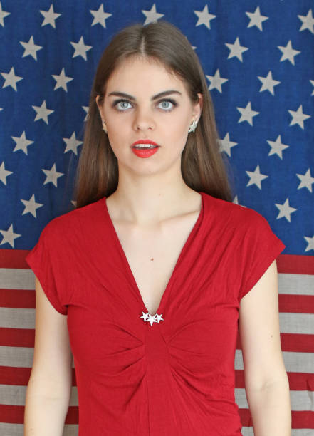 istock Patriotic Woman Poses 925589524