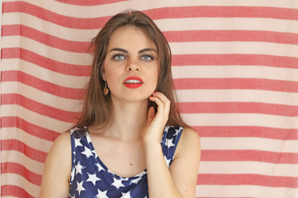 istock Patriotic Woman Poses 925589540