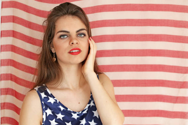 istock Patriotic Woman Poses 925589566