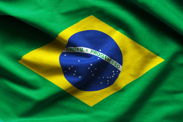 istock Brazilian flag fabric with waves 925590582