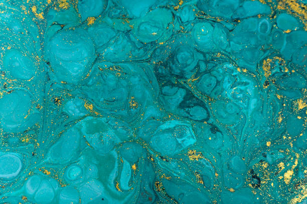 istock Marble abstract acrylic background. Nature green marbling artwork texture. Golden glitter. 925590752
