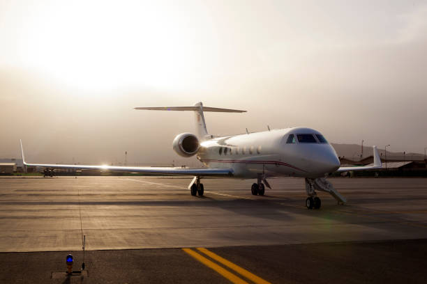 istock Private Jet On Airport Runway 925594038