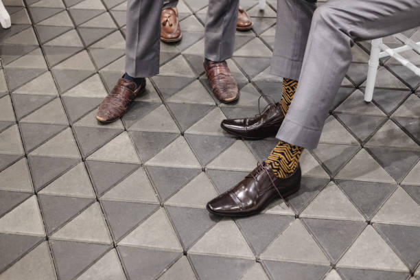 istock Close-up men wearing smart formal brown leather shoes 925600710
