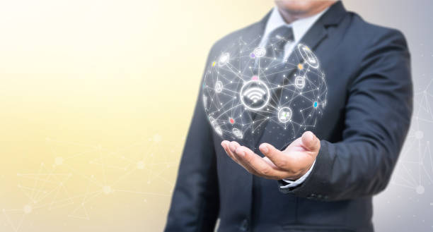 istock Businessman holding social network icon. 925605346