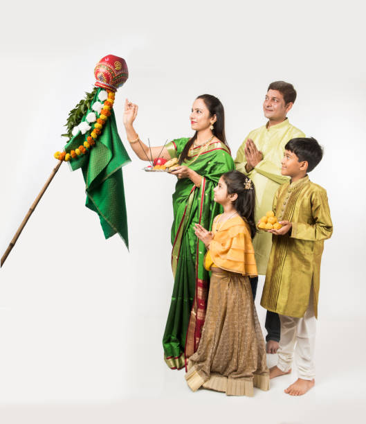 Indian family celebrating Gudi Padwa or Ugadi festival, which is a new year in Hindu tradition Indian family celebrating Gudi Padwa or Ugadi festival, which is a new year in Hindu tradition south indian lady stock pictures, royalty-free photos & images