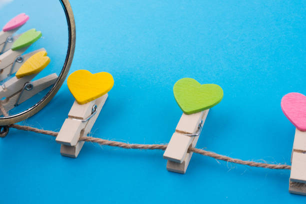istock Colorful clothespins attached  on a line 925611376