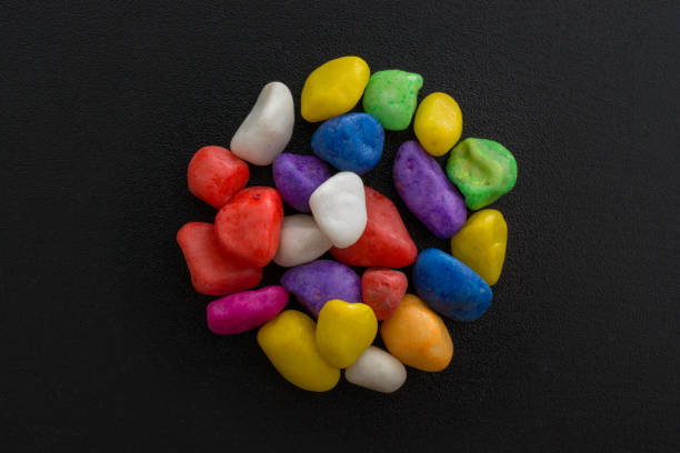 istock Pile of colorful pebbles as a stone background 925611380