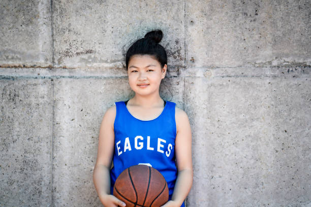 Asian Chinese Little Girl Playing Basketball Stock Photos, Pictures &  Royalty-Free Images - iStock