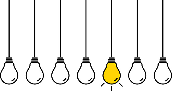 Vector illustration of seven hanging light bulbs.