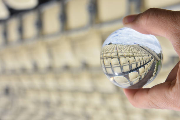 istock Chairs in the hall through a crystal ball 925616250