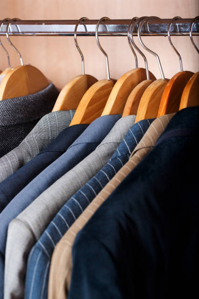 istock Open wardrobe of a business man. 925619720