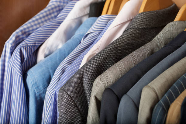 istock Open wardrobe of a business man. 925619750