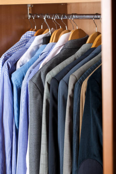 istock Open wardrobe of a business man. 925619756