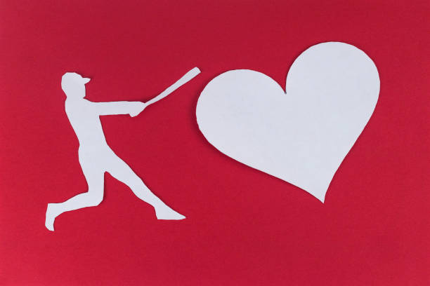 istock Baseball player hitting a heart. Divorce break up concept 925620076
