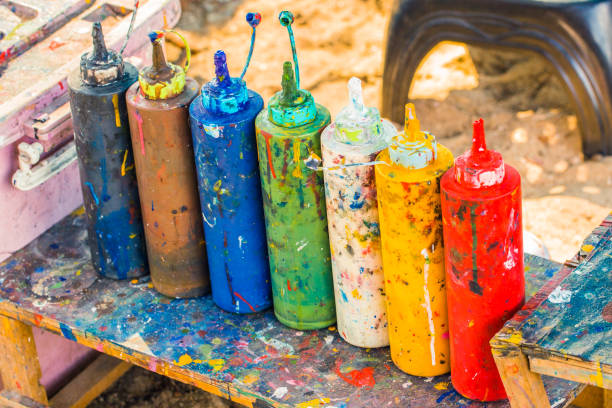 istock Paint bottles to be squeezed for art and craft education background 925620640