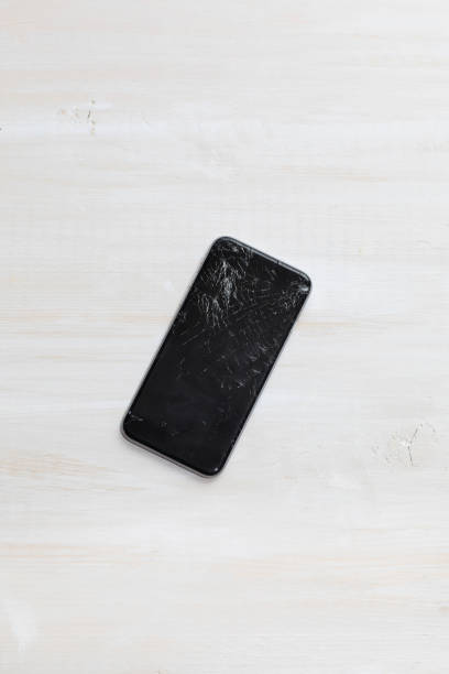 istock Broken glass of a black smartphone. 925620692