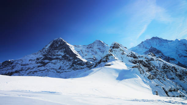 istock Jungfrau Eiger Monch Mountain peaks winter Swiss Alps 925636462