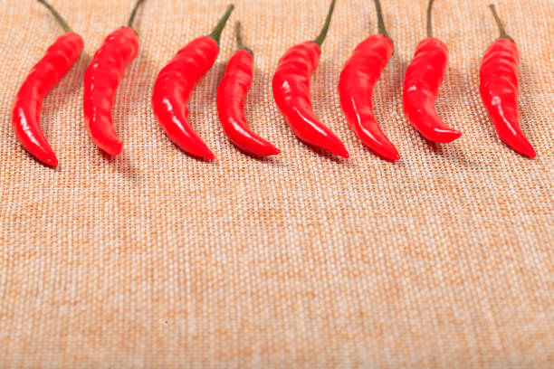 Bunch of red chillies taken on white background.
