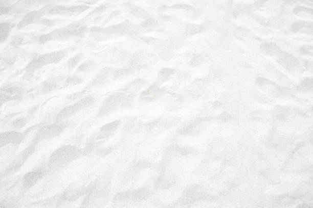texture de sable blanc sur la plage pour le fond - sable photos et images de collection