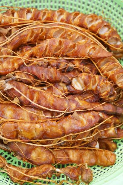 dry tamarind on green basket