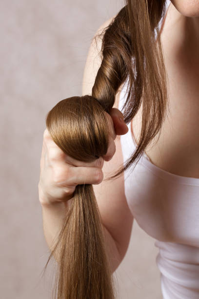 istock Long hair of a young lady. 925640862