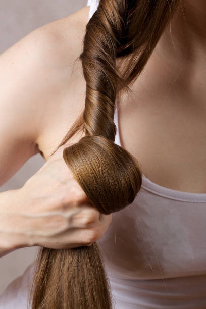 istock Long hair of a young lady. 925640988