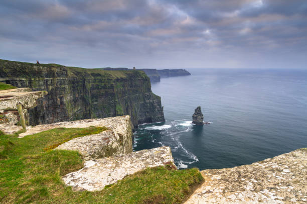 istock Cliffs of Moher in Ireland at cloudy day 925641180