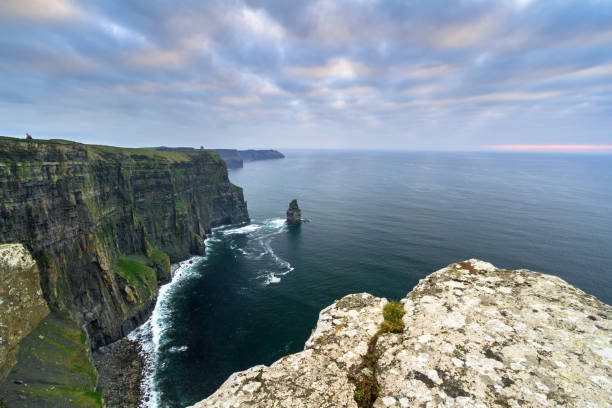 istock Cliffs of Moher in Ireland at cloudy day 925641184