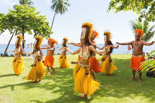 Papeete, French Polynesia - March 01, 2018 : Polynesian women perform traditional dance in Tahiti Papeete, French Polynesia. Polynesian dances are major tourist attraction of luxury resorts of French Polynesia.