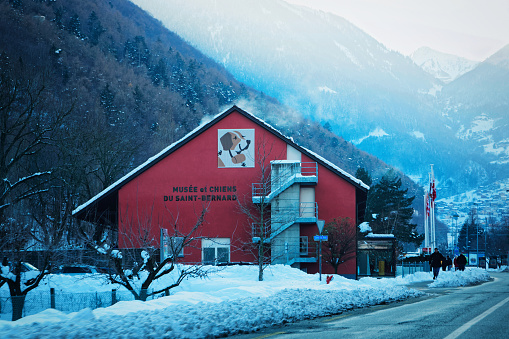 Martigny, Switzerland - January 1, 2015: Saint Bernard museum in Martigny, in Switzerland. Winter. People on the background
