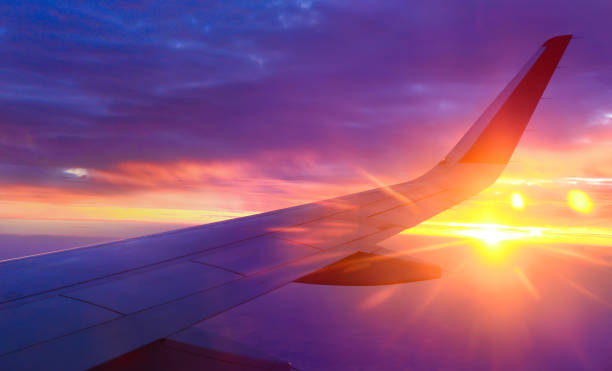 istock Colourful sky view from window seat. Sunset time. 925644206