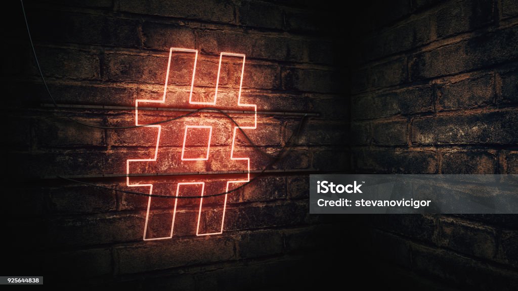 Hashtag Neon Sign Hashtag Neon Sign mounted on brick wall, illustration Social Media Stock Photo