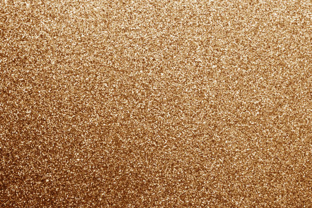 istock Glittering background in brown color. 925647962