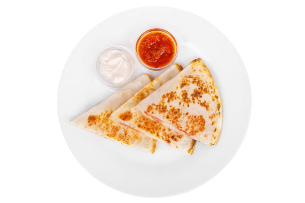 Quesadilla with chicken and tomatoes isolated stock photo