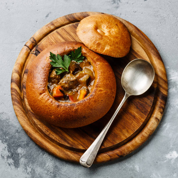 istock Beef meat soup Goulash in Bread 925657556