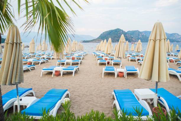 istock Sun loungers on a beach in Turkey 925660354