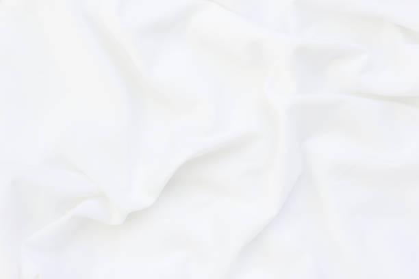 istock Close up of white bedding sheets and copy-space. 925661462