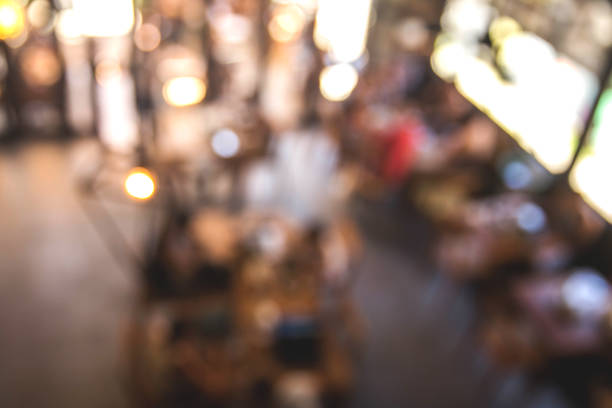 istock Blurred background of co-working place in coffee cafe 925664034