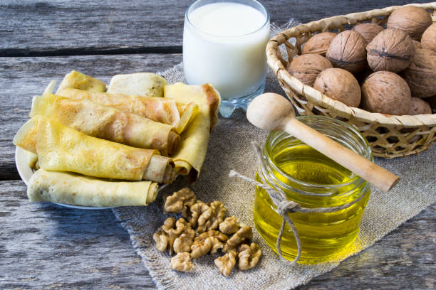 istock Homemade pancakes with cottage cheese and walnuts with honey 925664876