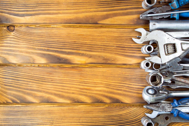 istock Hand tool. Old keys and screwdrivers on a wooden table 925668494