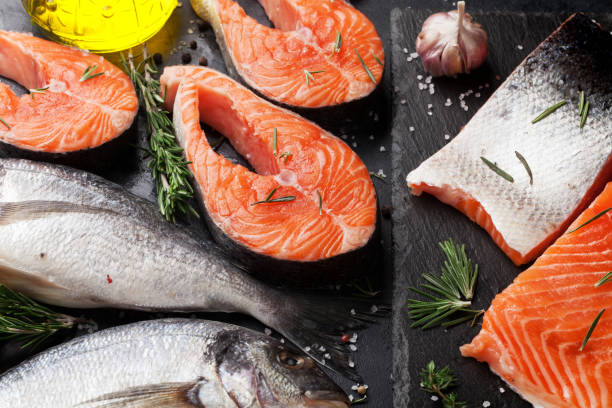 istock Raw salmon and dorado fish fillet 925673196