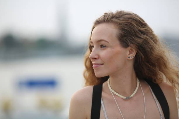 istock Young tourist woman at river walk 925674912