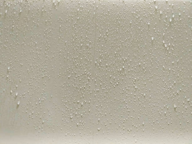 istock droplets of water on plain background 925682288