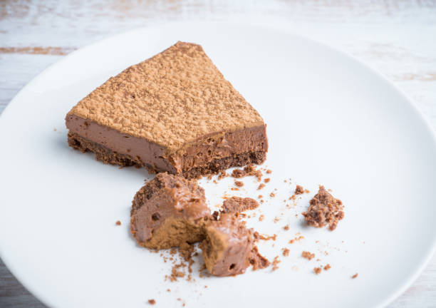 istock Tasty chocolate cheesecake on the rustic background 925685198
