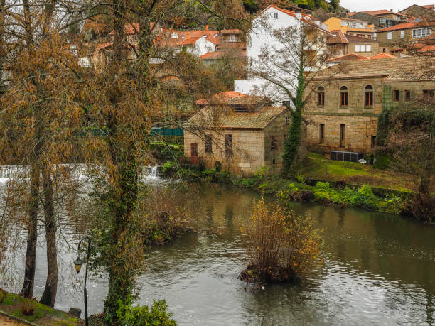 istock River and medieval village of Allariz 925689732