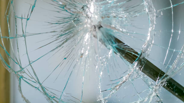 istock Breaking glass of window 925693892