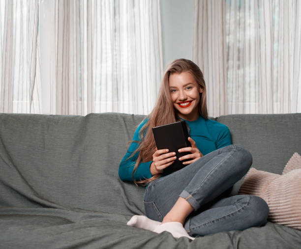 istock woman on digital tablet 925698282