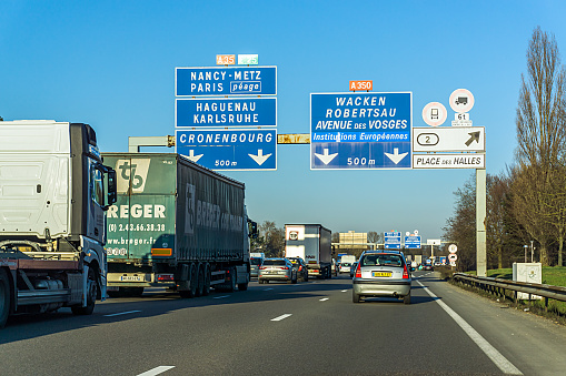 Strasbourg, France - February 14, 2018: Traffic on the highway towards Strasbourg in winter.